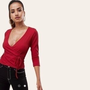 Pretty Little Thing Ribbed Side Wrap Top in Red